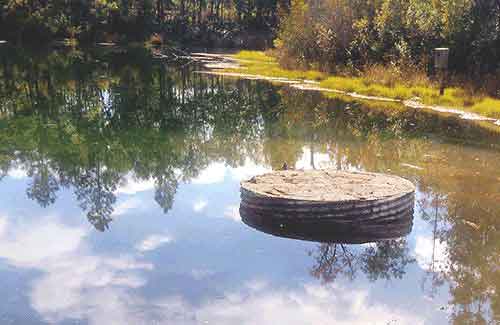 Corrugated-metal-pipe-for-use-in-pond-and-dam